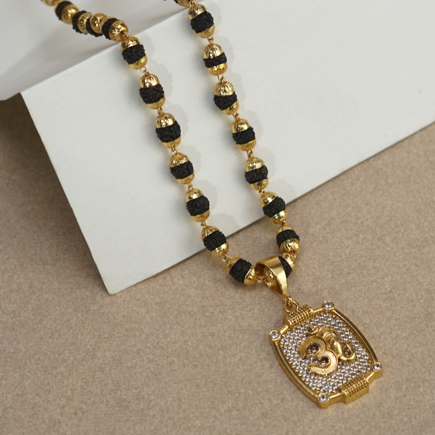OMKARA PREMIUM GOLD PLATED PENDANT WITH RUDRAKSHA MALA (MALA-23 INCH)
