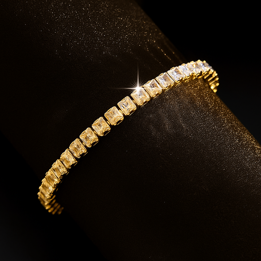 Gold bracelet with clear stones on a black background