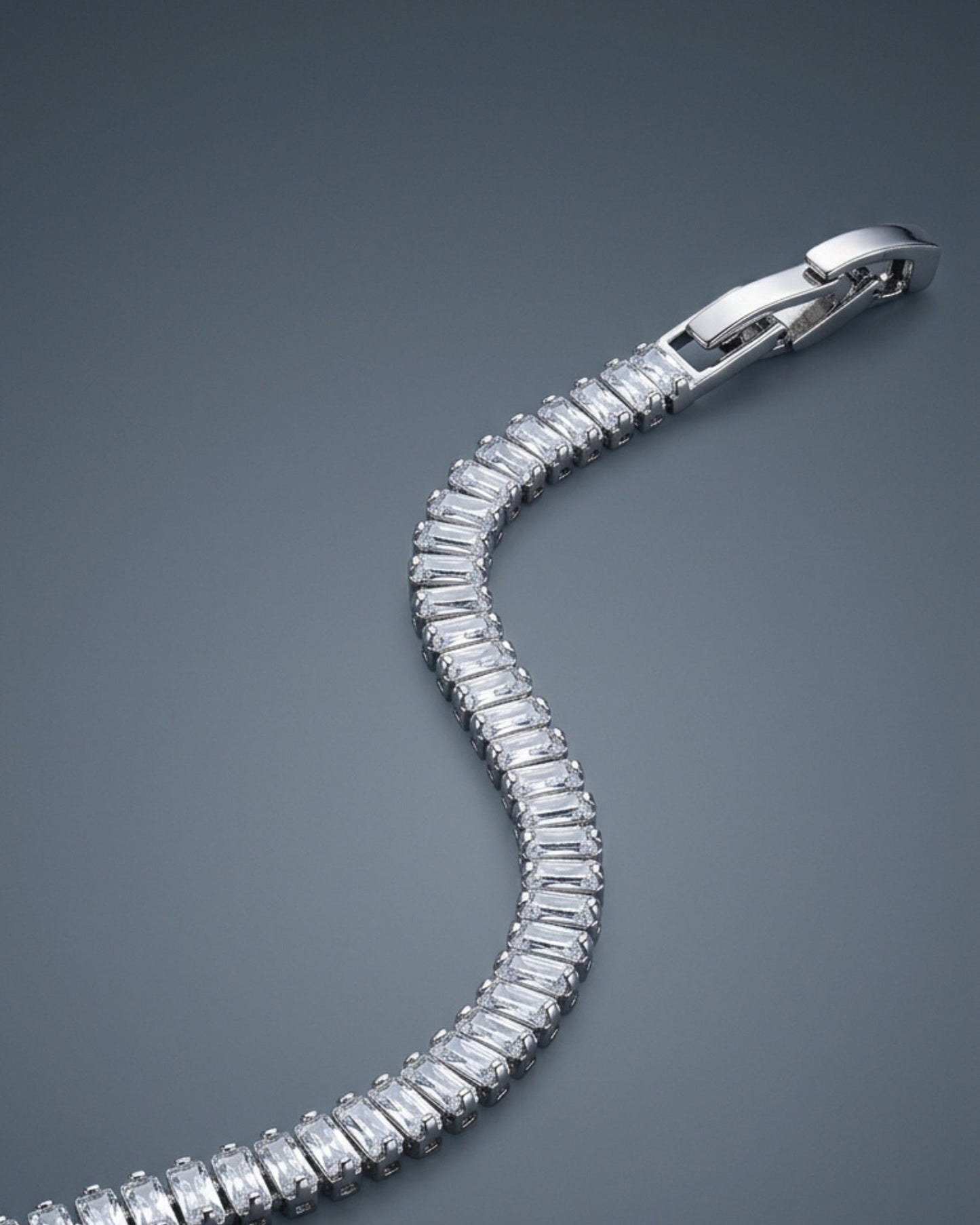 Diamond bracelet on a dark gray background