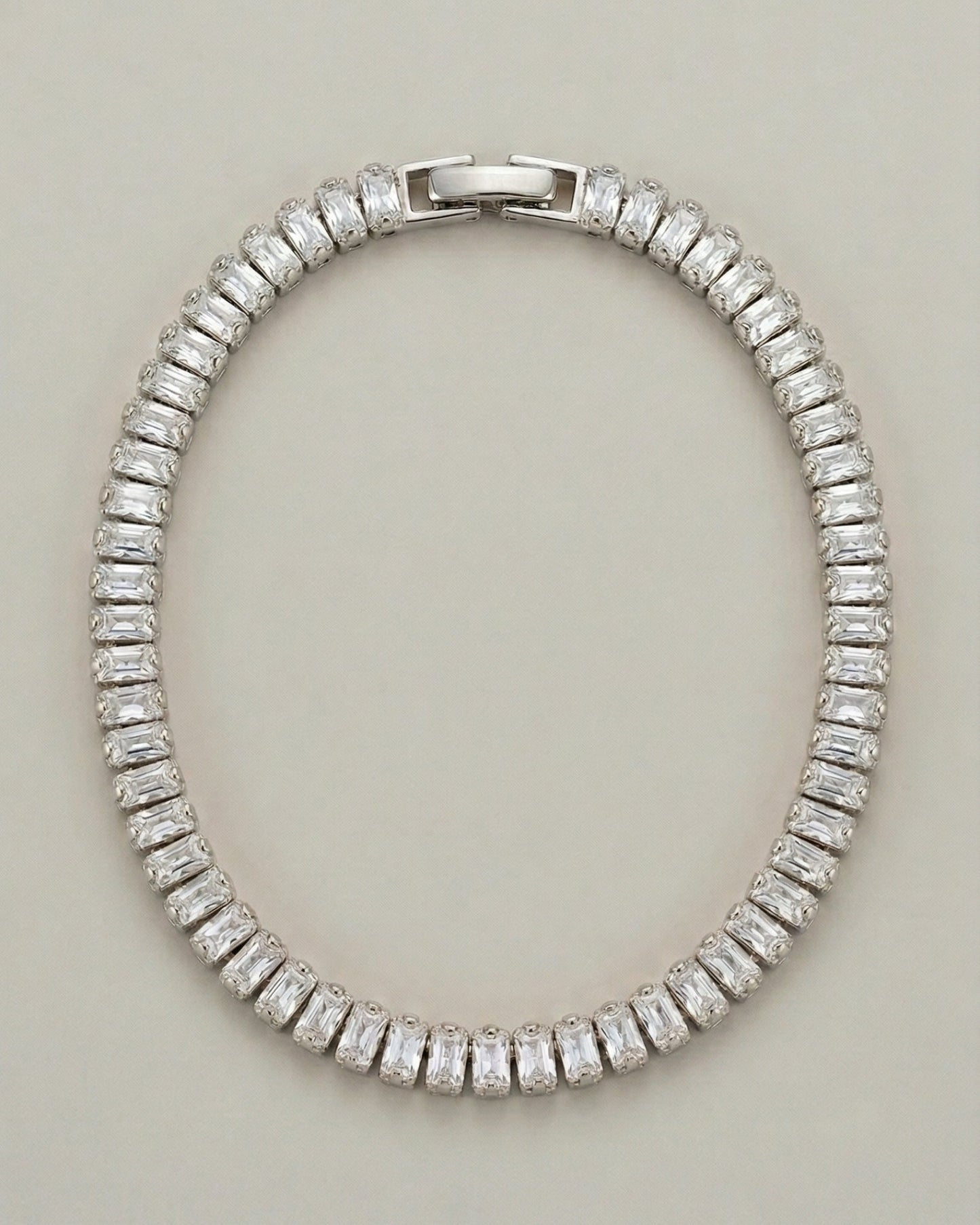 Diamond bracelet on a light gray background